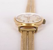 Zlaté hodinky Doxa