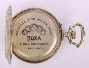 Velké,plastické kapesní hodinky Doxa