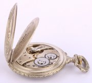 Velké,plasticky zdobené kapesní hodinky Doxa
