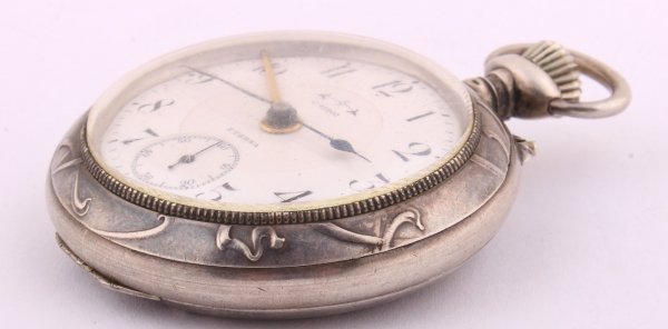 Stříbrné secesní, plasticky zdobené kapesní hodinky Eterna s budíkem