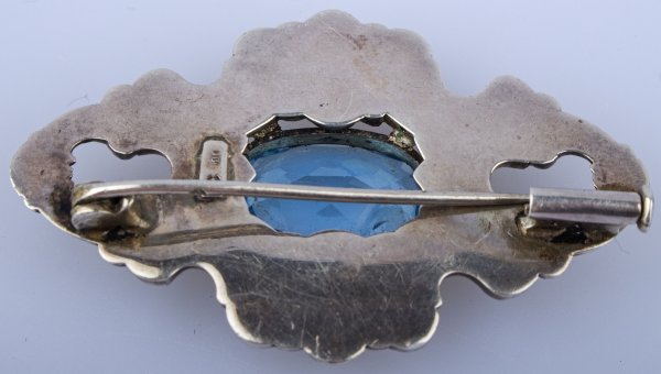 Stříbrná brož s modrým sklem