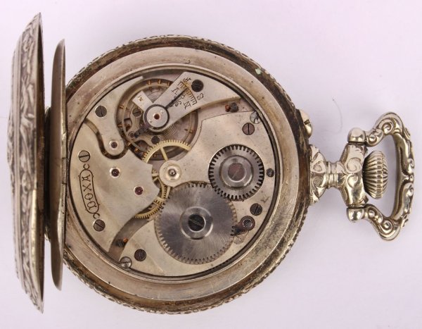 Velké,plasticky zdobené kapesní hodinky Doxa