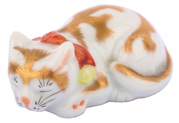 Porcelánová plastika spícího kotěte