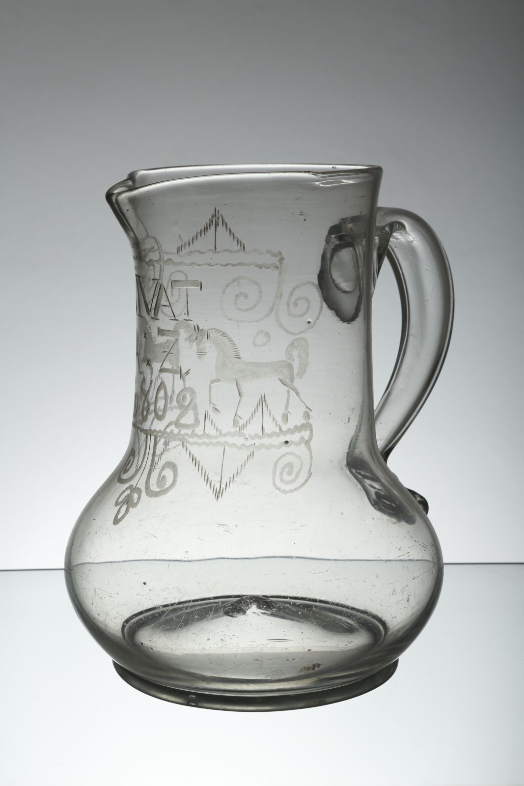 A Large Empire glass pitcher 