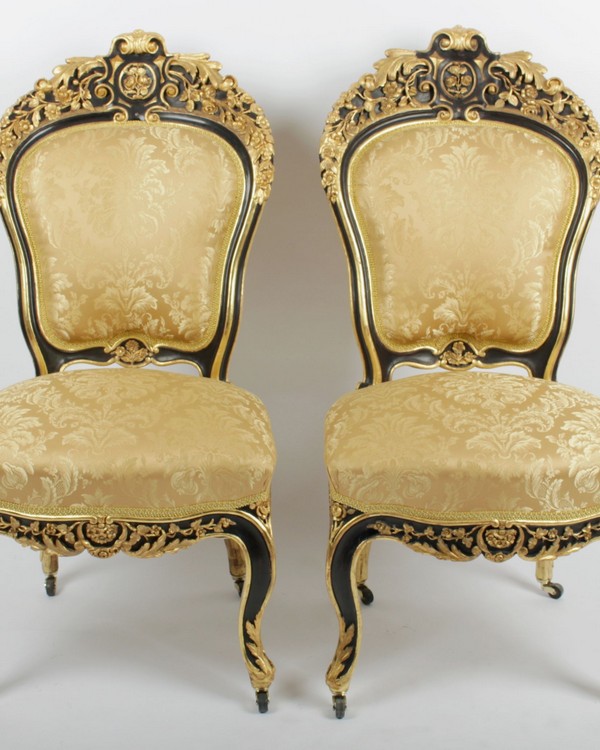 A Pair of Very Rare Rococo Carved Armchairs